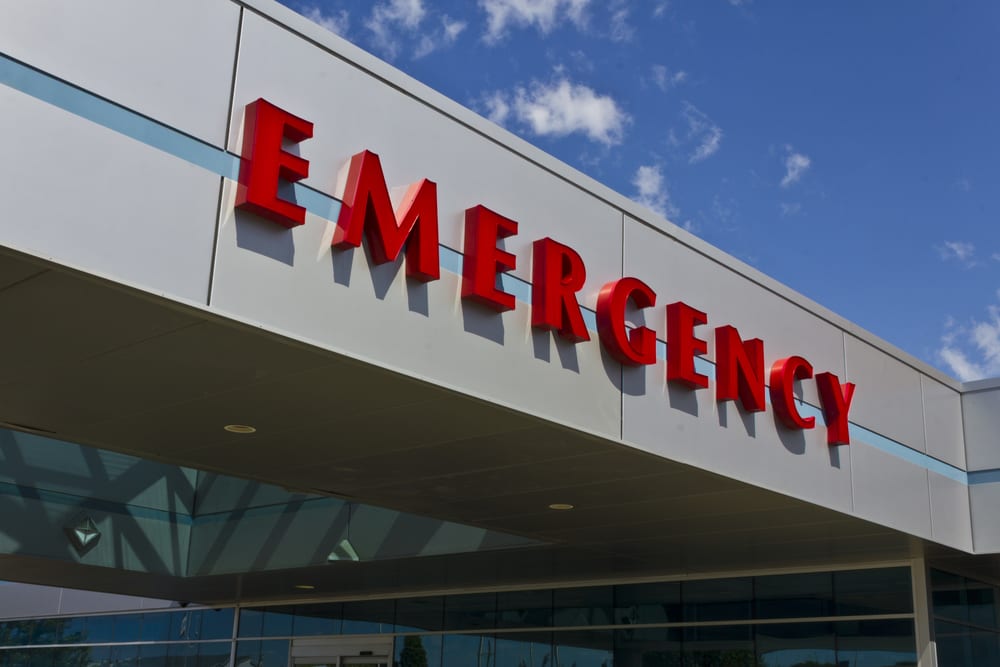 A building sign with bold red letters spelling 