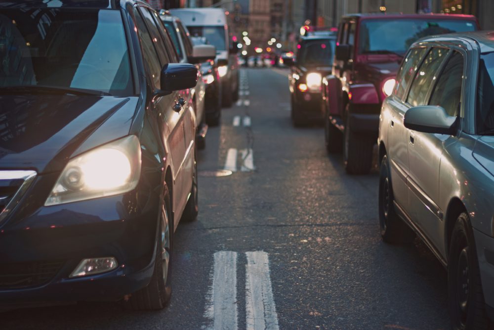 Busy street crowded with cars