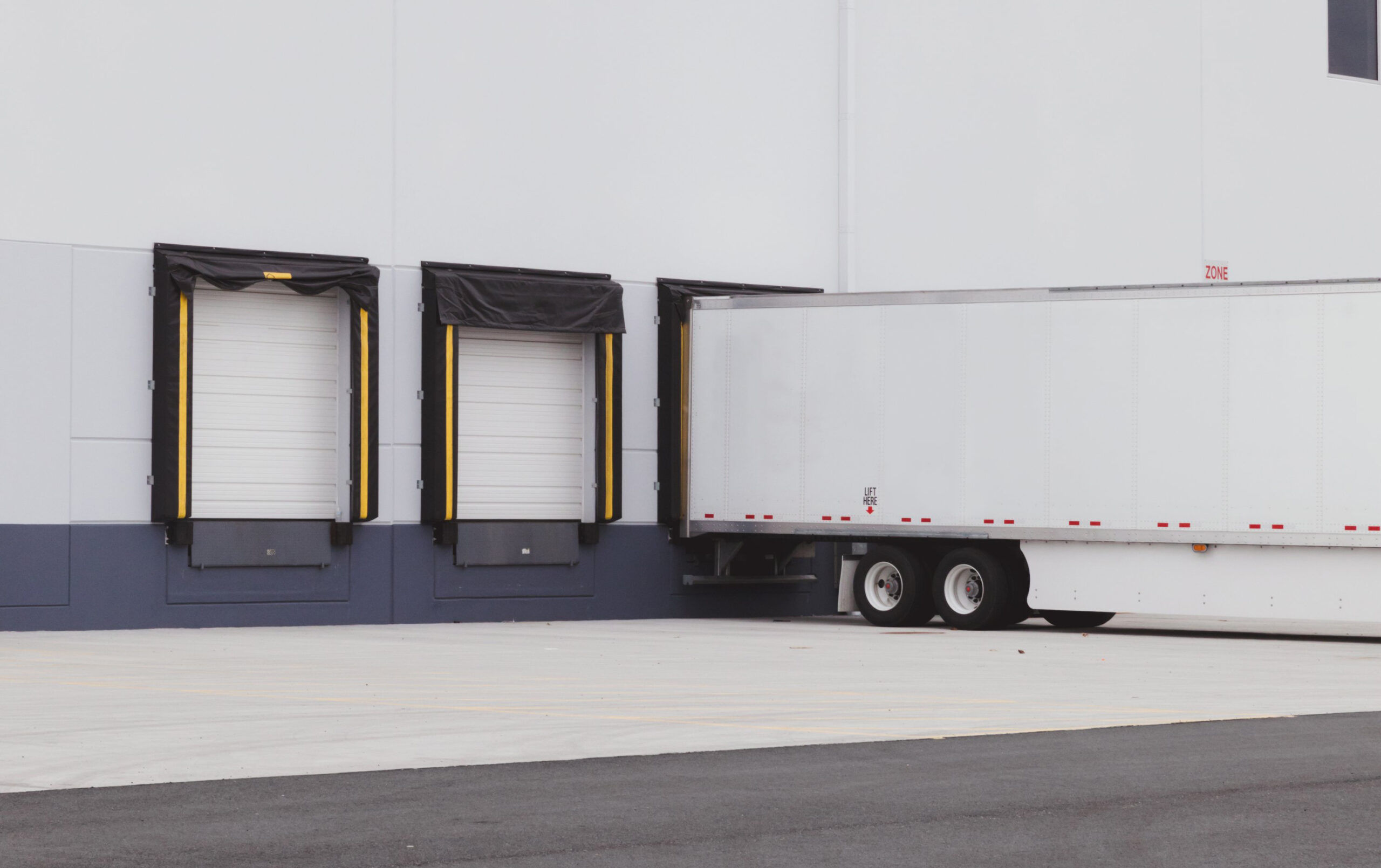 semi truck outside of a warehouse