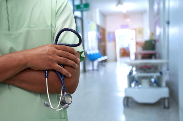 Close up unknown nurse and stethoscope in hospital